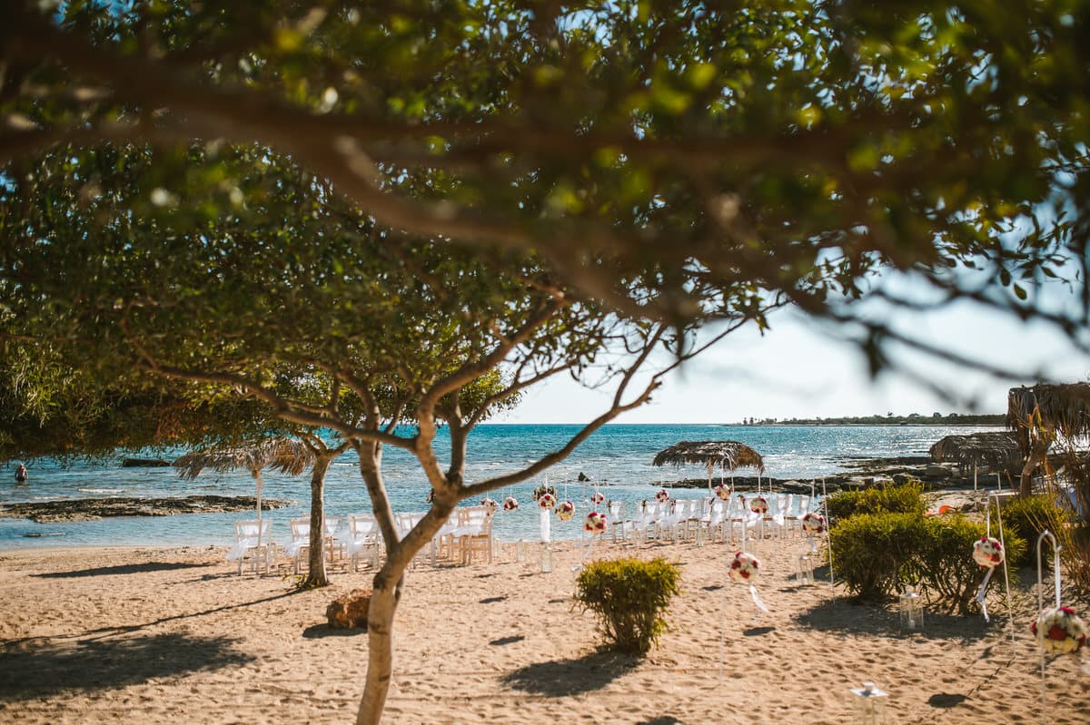 Couple by turquoise water at Thalassines Beach, east Cyprus