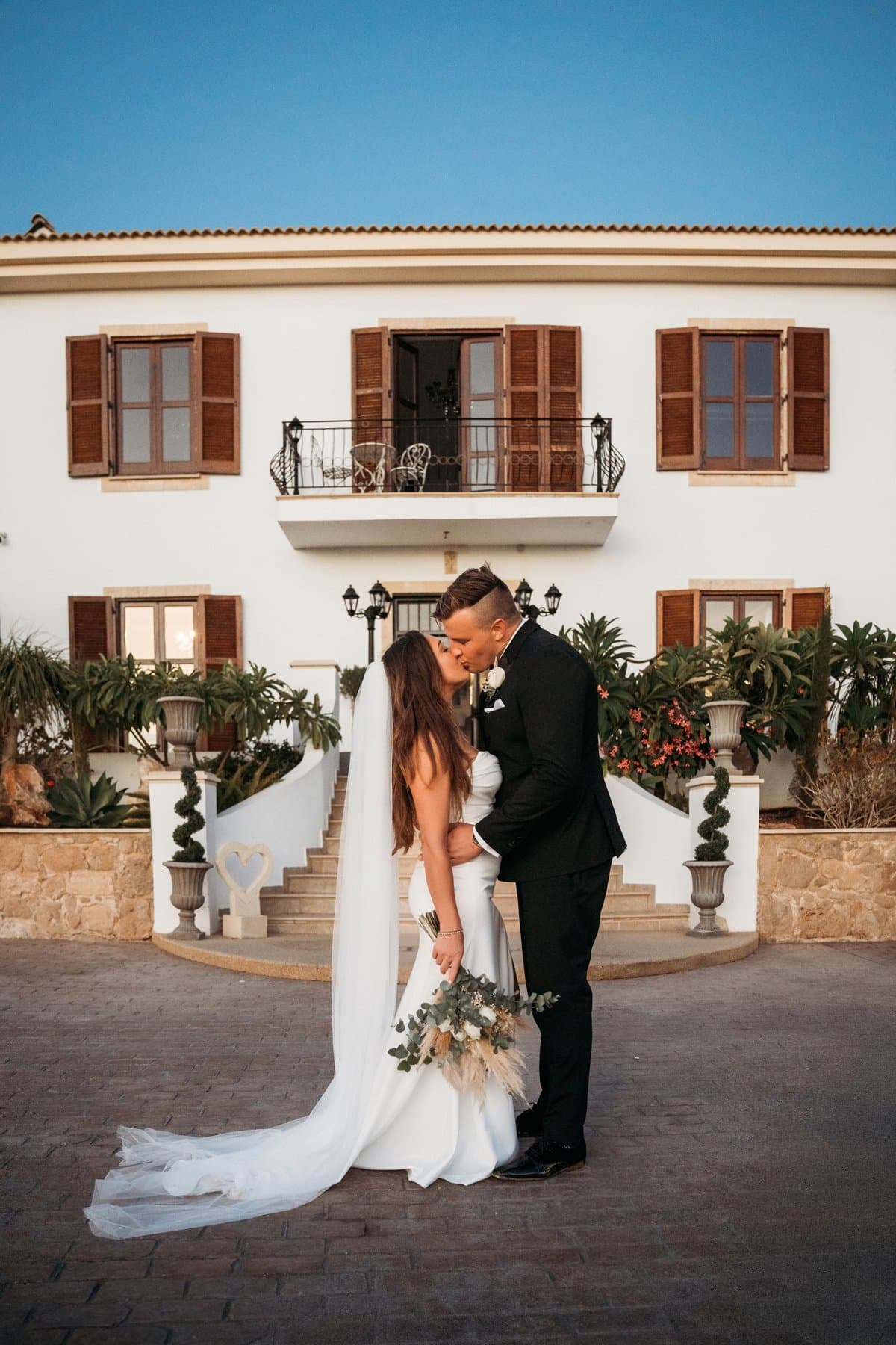 Couple at the entrance of a Cyprus wedding villa