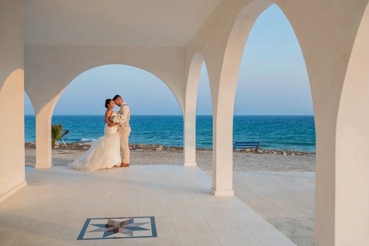 Bride beneath the chapel arches at Agia Thekla