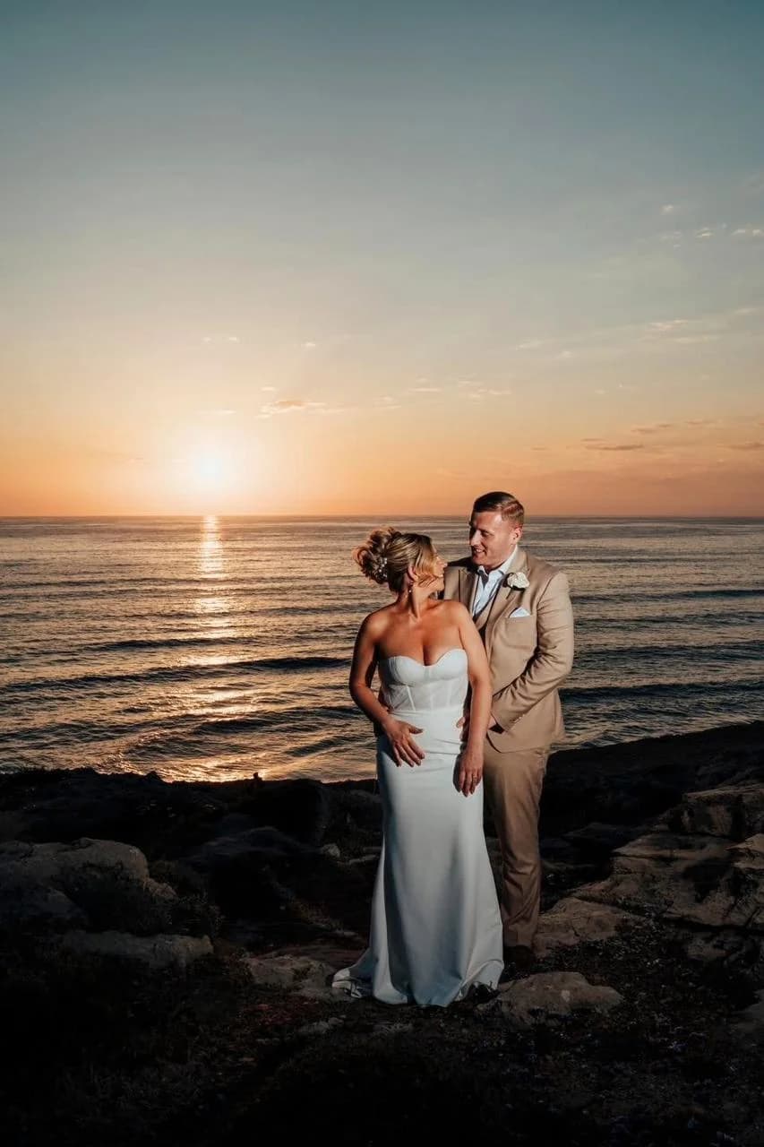 Couple at sunset on Agios Georgios Beach