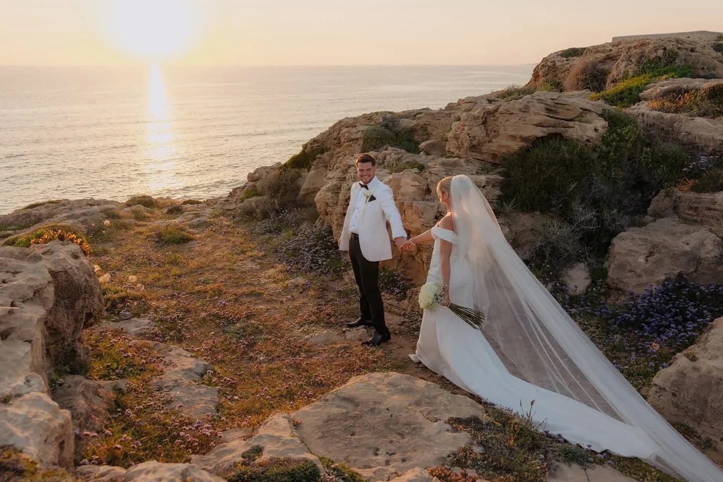 Couple among the coastal rocks near Alassos
