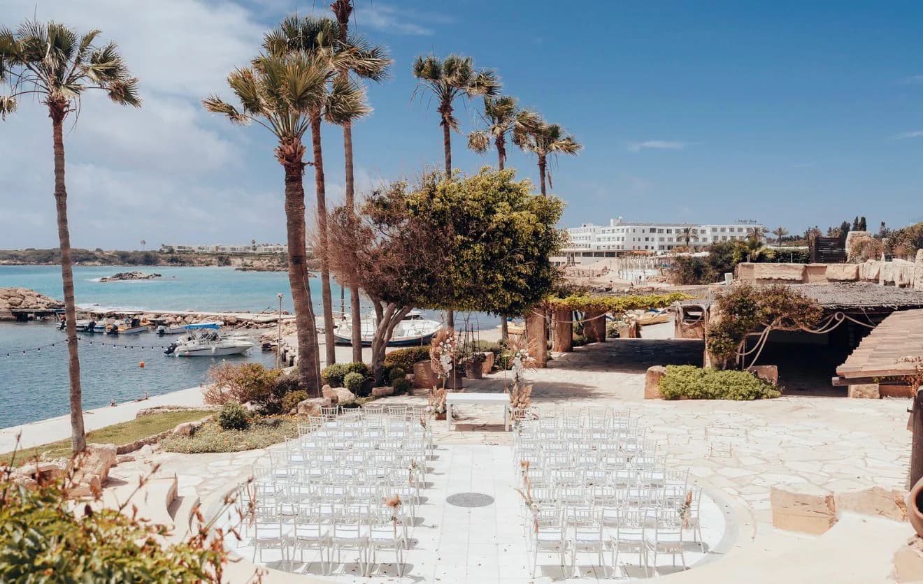 Ceremony seating overlooking the harbour at Coral Beach Hotel