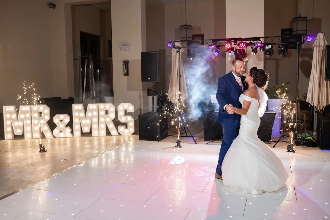Couple on the reception dance floor at Elea