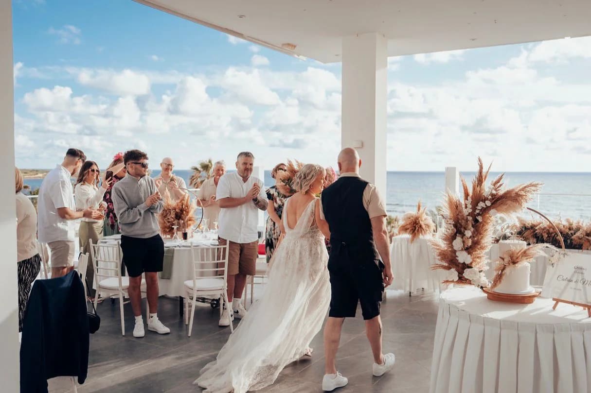 Couple sharing their first dance at Kefalos Beach