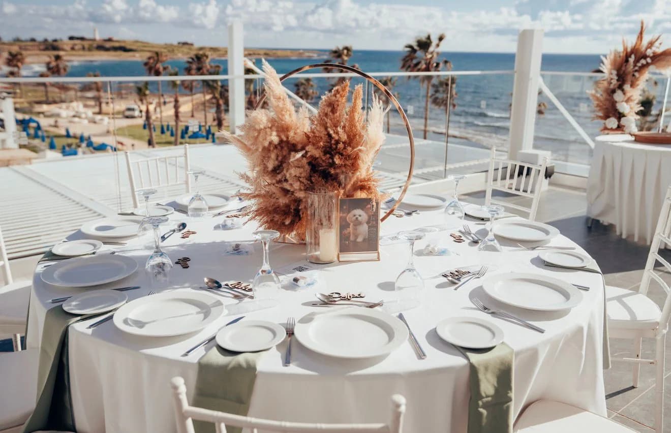Wedding reception table overlooking the sea at Kefalos Beach