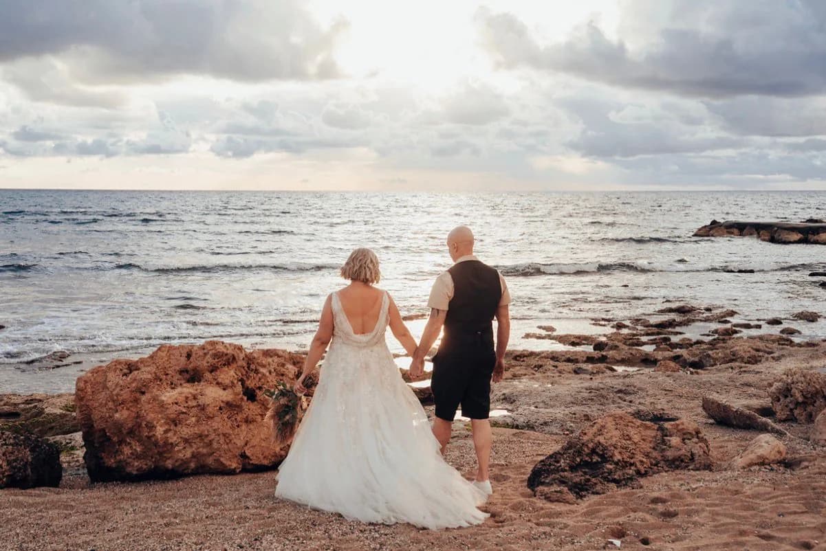 Newlyweds beside the Mediterranean at Kefalos Beach