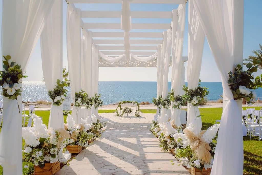 Seaside ceremony aisle at King Evelthon