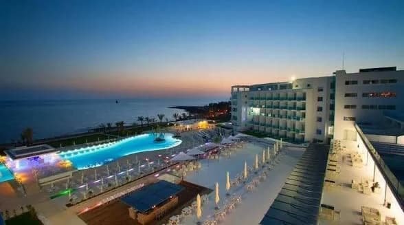 Evening view of King Evelthon and its pool