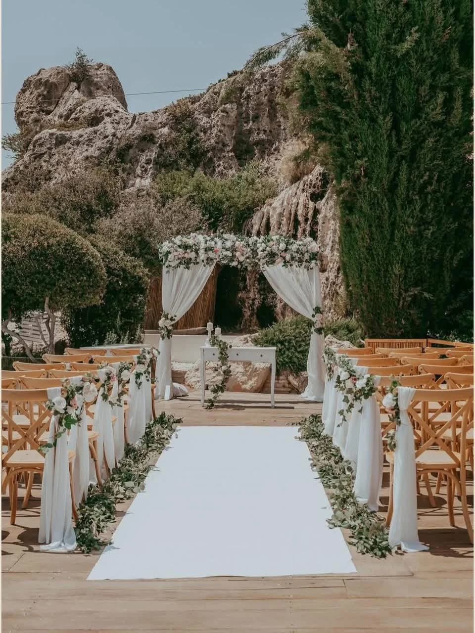 Waterfall-side ceremony setting at Paliomonastiros