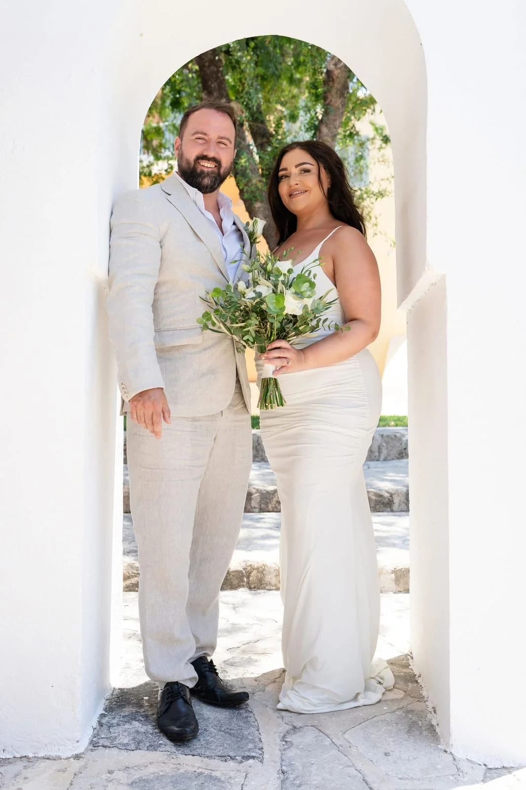 Couple beneath an arch at Paphos Municipal Art Gallery
