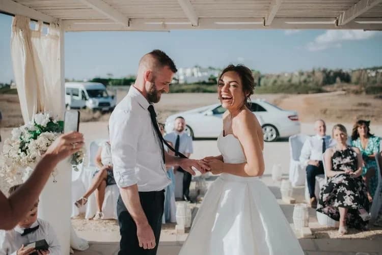 Couple during a seaside ceremony at Shipwreck
