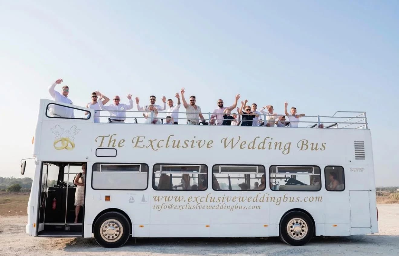 Wedding bus at Sirenes Beach
