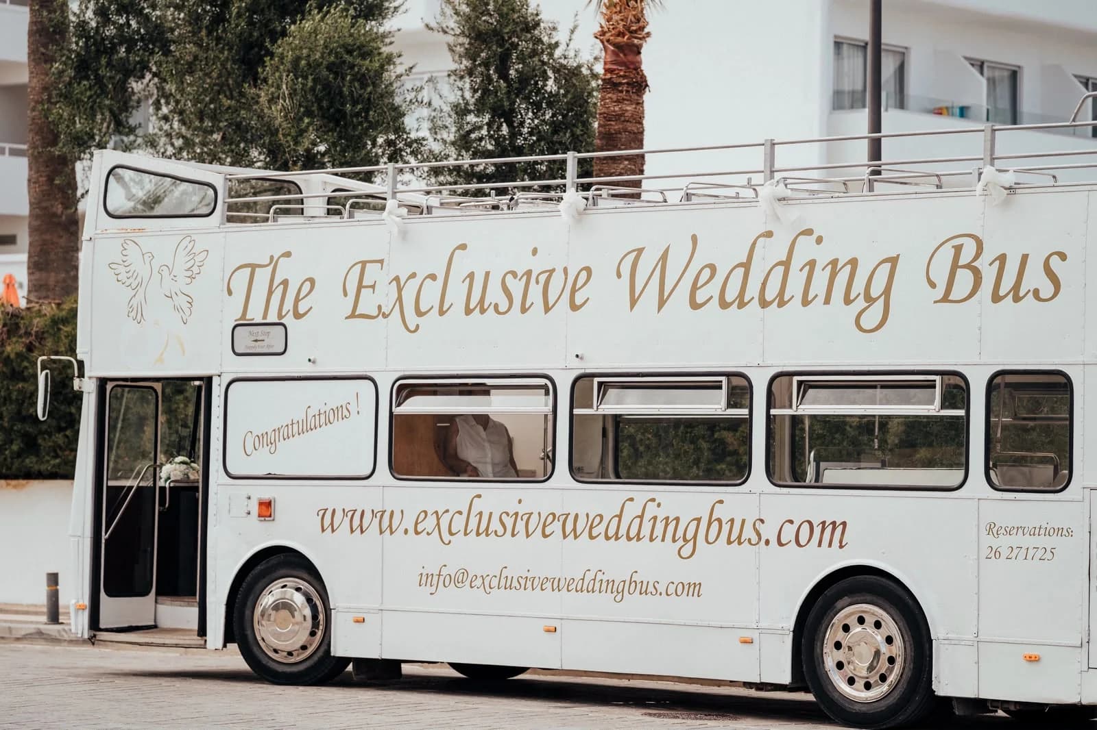 Wedding bus beside the beach at Sirenes Beach