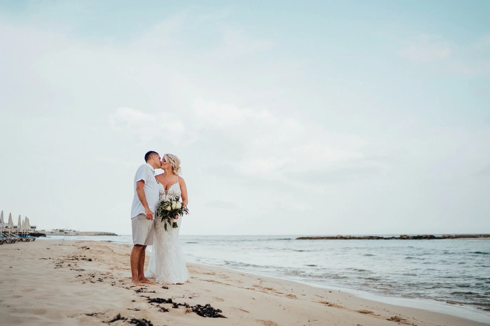 Couple on the beach at Sirenes Beach